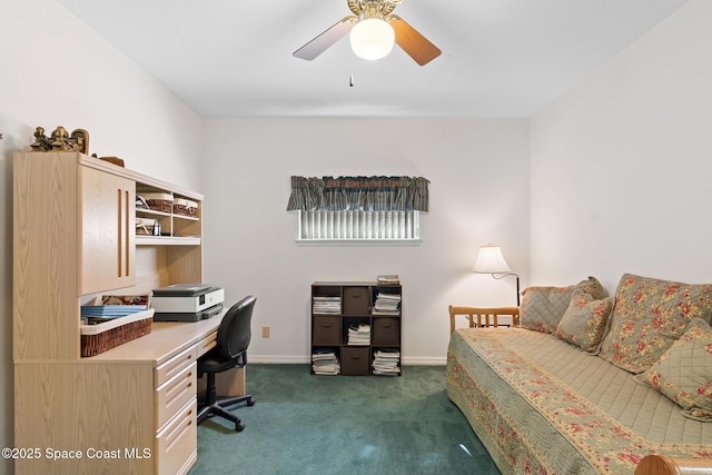 carpeted home office with ceiling fan