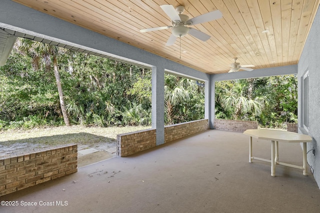 view of patio featuring ceiling fan