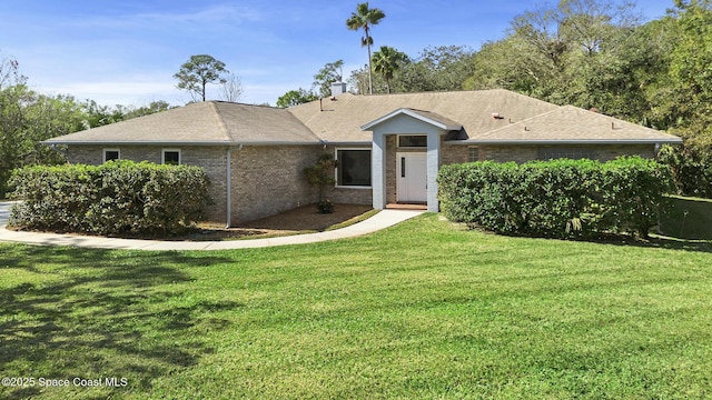 single story home with a front yard