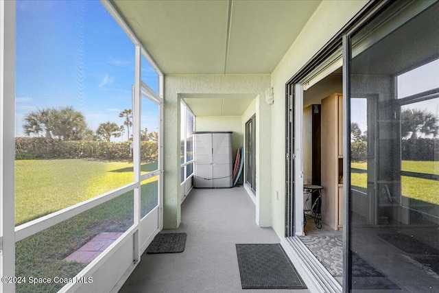 unfurnished sunroom with a healthy amount of sunlight