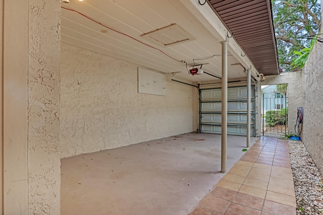 garage featuring a garage door opener