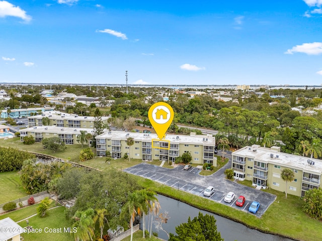 drone / aerial view with a water view