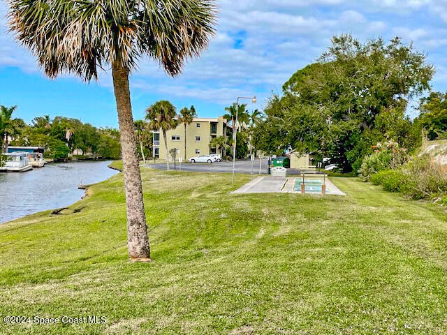 view of yard with a water view