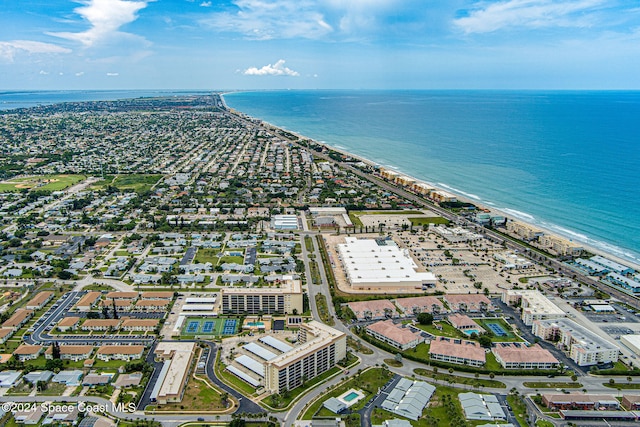 aerial view with a beach view and a water view