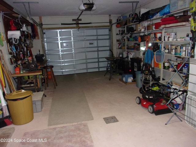 garage featuring a garage door opener