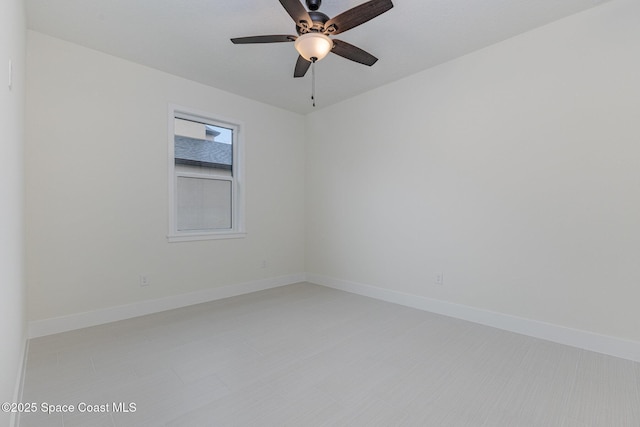 unfurnished room with ceiling fan