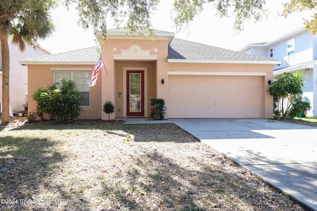 view of front of property featuring a garage