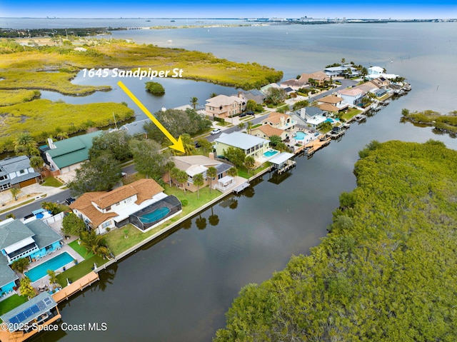 drone / aerial view featuring a water view