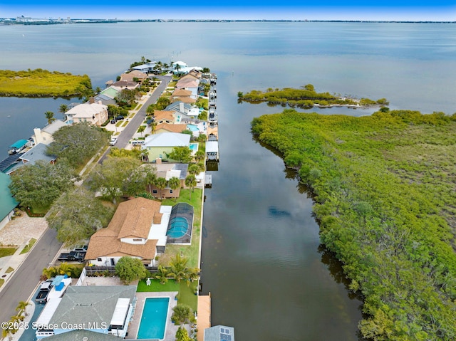 drone / aerial view with a water view