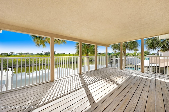 deck featuring a water view