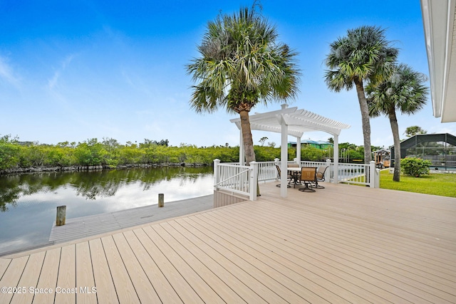 dock area with a water view and a pergola