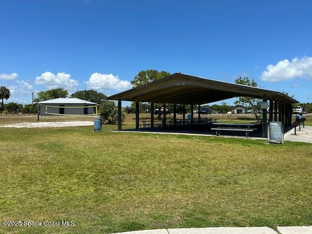 view of property's community featuring a gazebo and a lawn