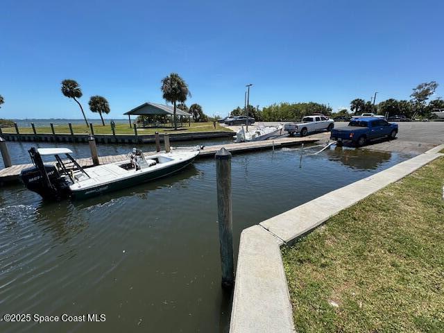 view of dock with a water view