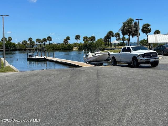 dock area featuring a water view