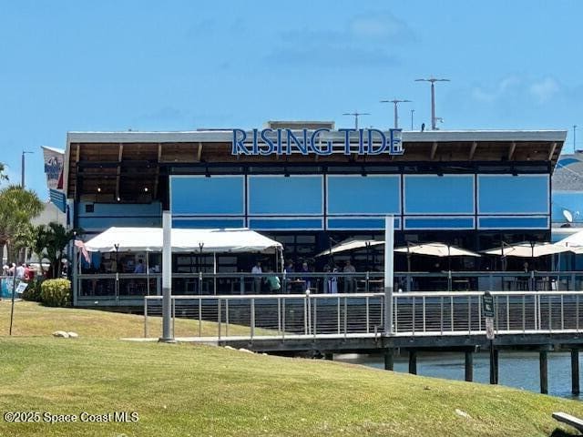 view of building exterior with a water view