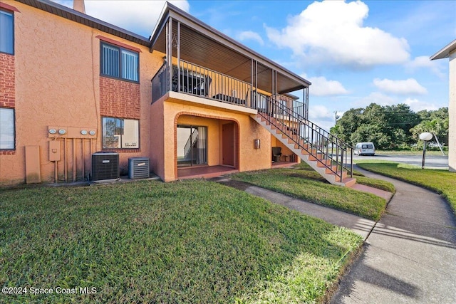 exterior space featuring central AC unit