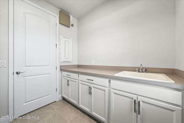 bathroom featuring tile patterned floors and vanity