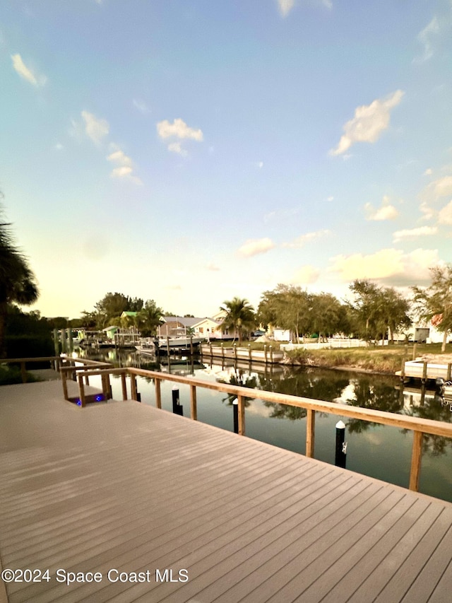 dock area with a water view