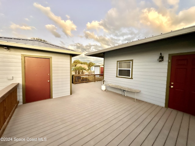 view of deck at dusk