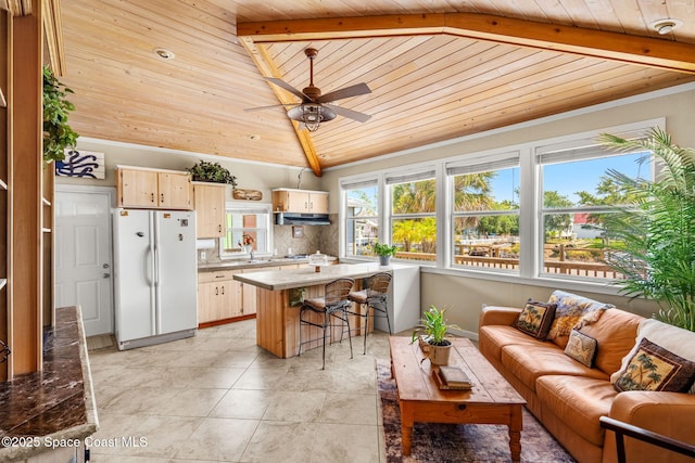 36 Vip Is Unit A, Grant, FL 32949 - living room with wooden ceiling, lofted ceiling, ceiling fan, and light tile patterned floors