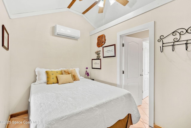 36 Vip Is Unit A, Grant, FL 32949 - bedroom with an AC wall unit, light tile patterned floors, lofted ceiling, a ceiling fan, and baseboards