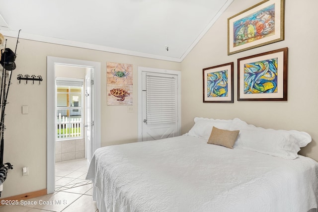 36 Vip Is Unit A, Grant, FL 32949 - bedroom with vaulted ceiling, light tile patterned flooring, baseboards, and ornamental molding