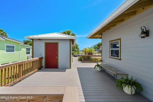 36 Vip Is Unit A, Grant, FL 32949 - wooden terrace featuring an outbuilding and a shed