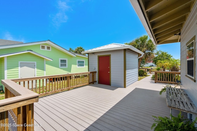 36 Vip Is Unit A, Grant, FL 32949 - wooden terrace with a storage unit and an outbuilding