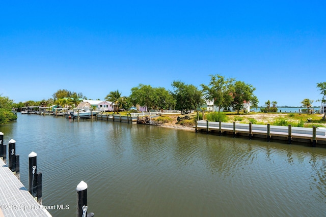 36 Vip Is Unit A, Grant, FL 32949 - dock featuring a water view