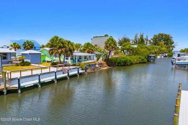 36 Vip Is Unit A, Grant, FL 32949 - dock featuring a water view