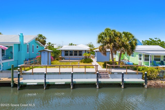 36 Vip Is Unit A, Grant, FL 32949 - back of property featuring a water view