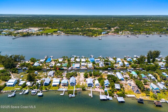 36 Vip Is Unit A, Grant, FL 32949 - aerial view of property and surrounding area with a large body of water and nearby suburban area
