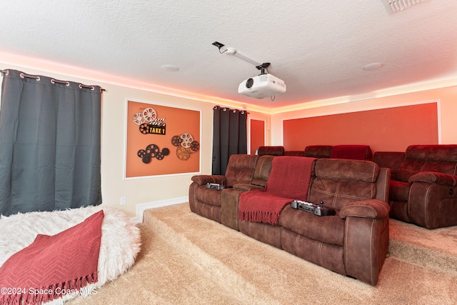 carpeted cinema featuring a textured ceiling