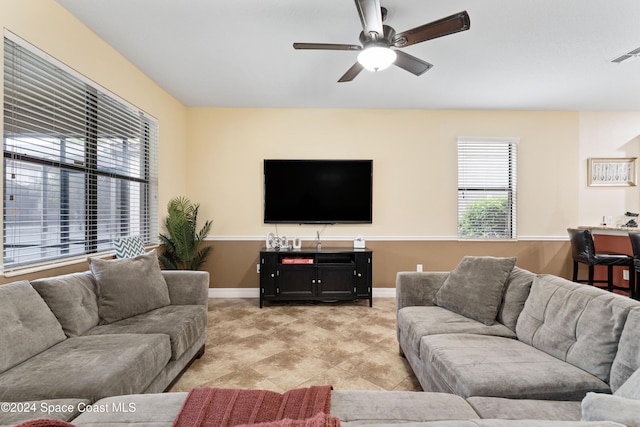 living room with ceiling fan