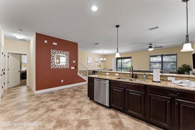 kitchen with dark brown cabinetry, dishwasher, sink, decorative light fixtures, and ceiling fan with notable chandelier