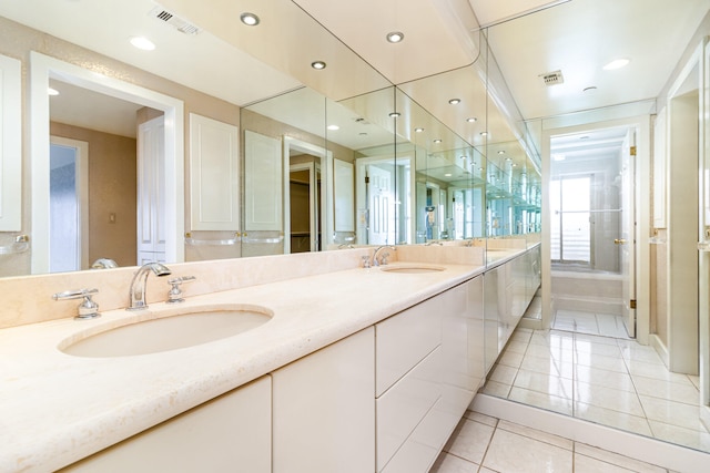 bathroom with vanity and tile patterned floors