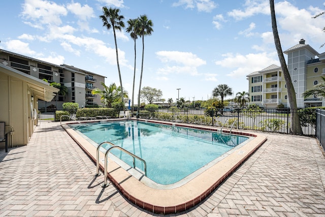 view of swimming pool with a patio area