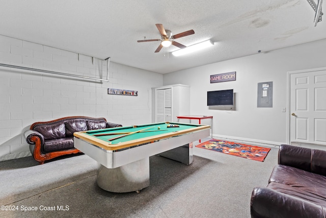 playroom with electric panel, ceiling fan, a textured ceiling, and pool table