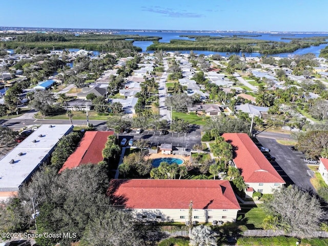 bird's eye view with a water view