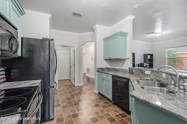 kitchen featuring kitchen peninsula, sink, stainless steel appliances, and ornamental molding