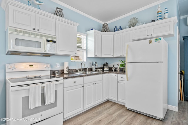 kitchen with white appliances, white cabinets, sink, light hardwood / wood-style flooring, and ornamental molding