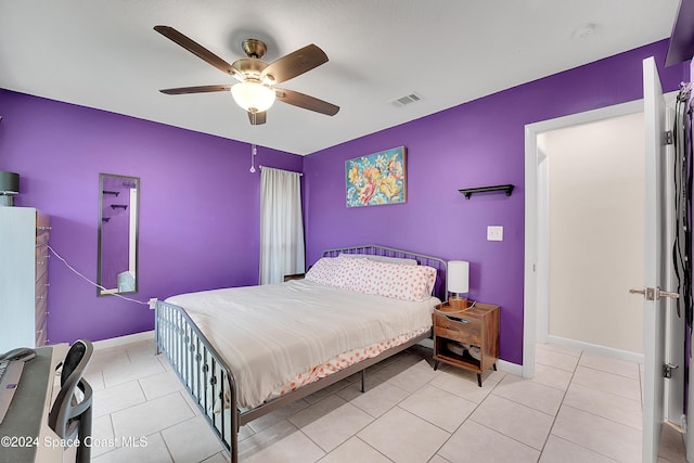 bedroom featuring ceiling fan and light tile patterned floors