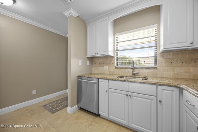 kitchen featuring decorative backsplash, stainless steel dishwasher, crown molding, sink, and white cabinetry