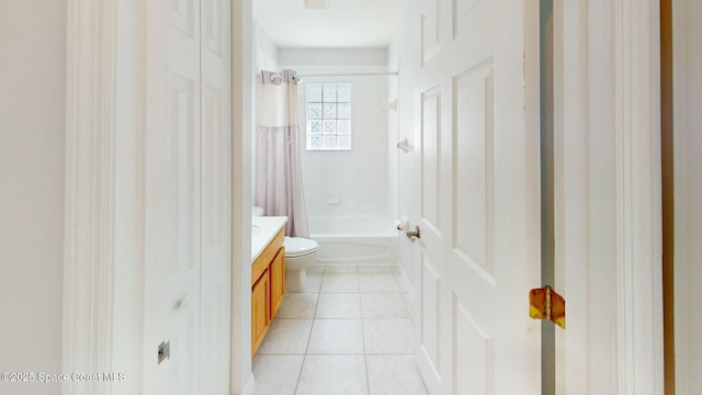 full bathroom featuring tile patterned flooring, vanity, shower / bath combination with curtain, and toilet