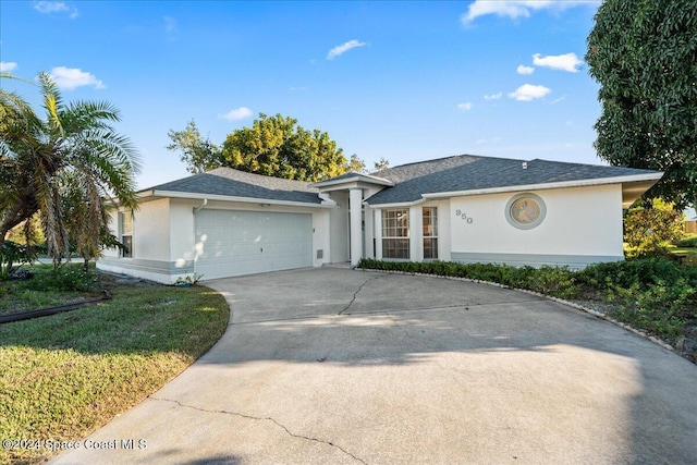 ranch-style home with a garage