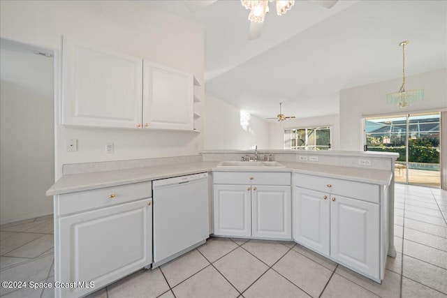 kitchen with kitchen peninsula, white dishwasher, white cabinets, and sink