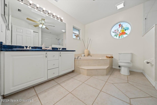 full bathroom featuring tile patterned floors, vanity, separate shower and tub, ceiling fan, and toilet