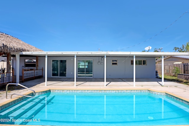 view of swimming pool featuring a patio area