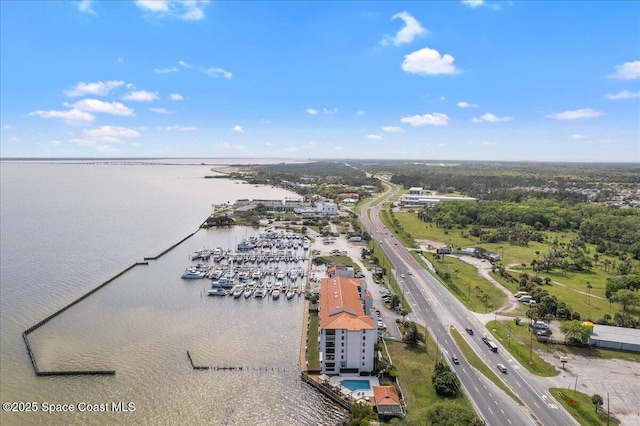 drone / aerial view with a water view