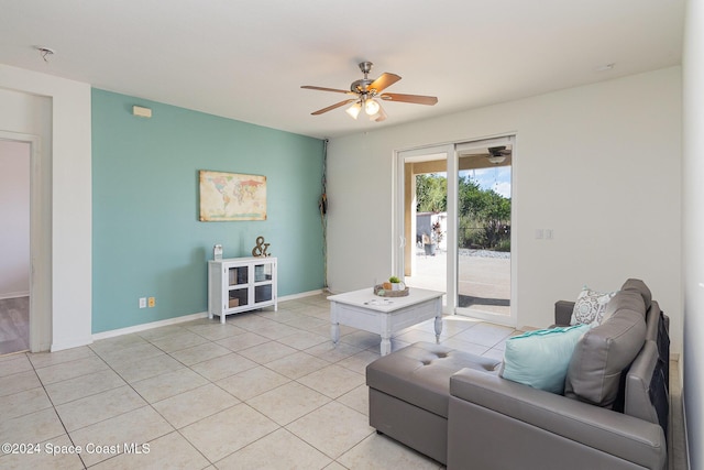 living room featuring ceiling fan and light tile patterned floors